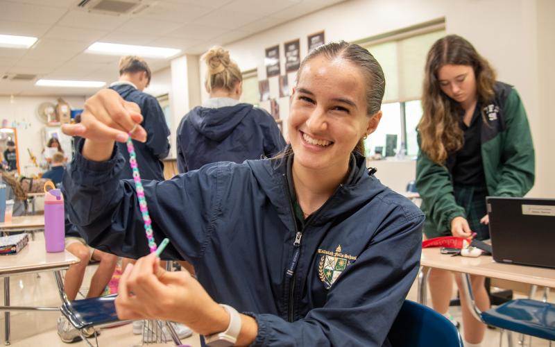 Photos courtesy Tallulah Falls School. Megan Prince creates bracelets for hospital care packages through the National Honor Society. She logged more than 26 service hours during the fall semester.