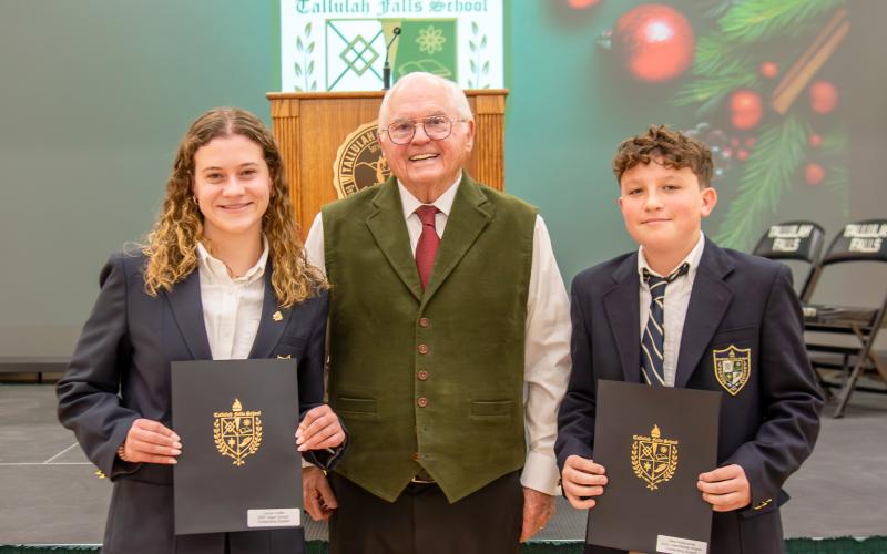 Photo courtesy of TFS. Senior Carsyn Griffis of Tallulah Falls and eighth-grader West Ridlehoover stand with President and Head of School Dr. Larry A. Peevy. Griffis was named as Upper School Outstanding Student of the Year and Ridlehoover was named as Middle School Outstanding Student of the Year.