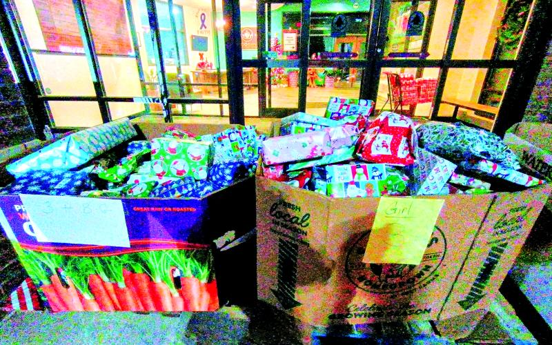 Megan Horn/The Clayton Tribune. There were many gifts for children of all ages at the Food Bank of Northeast Georgia for the gift drive on Tuesday, Dec. 16.