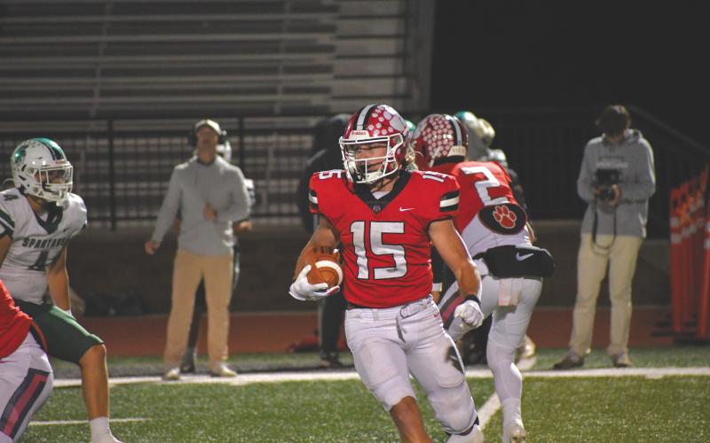 Wesley Branch/The Clayton Tribune. Rabun County senior Reid Giles runs during Rabun County’s 49-46 Oct. 24 loss to Athens Academy. Giles led the Wildcats, who made the Class A Division I quarterfinals this season, in rushing, receiving and return yardage. Giles was selected first team all-state.