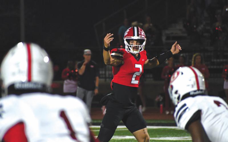 Wesley Branch/The Clayton Tribune. Rabun County senior quarterback Ty Truelove, an Erskine College commit, signals to his teammates before a play in Rabun County’s 35-0 win over Berrien in the second round of the GHSA state playoffs on Nov. 21, 2025. Truelove led the Wildcats to two state quarterfinal appearances in three years as a starter.