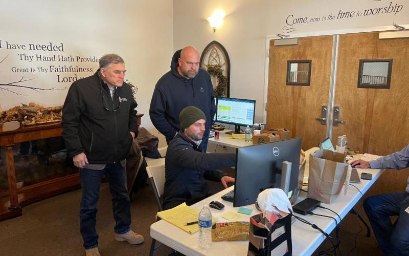 Photos courtesy Rep. Andrew Clyde’s Office. Clyde receives an update from Georgia Power’s Northeast Area Manager Jeremy Spradlin on restoration progress. Special thanks to Battle Branch Baptist Church for hosting Georgia Power’s operating base.
