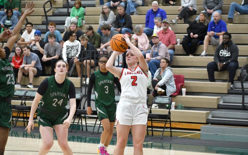 Wesley Branch/The Clayton Tribune. Rabun County junior Adelyn Thompson pulls up for a jump shot in Rabun County’s 50-38 loss to Athens Academy on Feb. 20 at Piedmont University. Thompson led the Lady Cats in scoring with 16 points