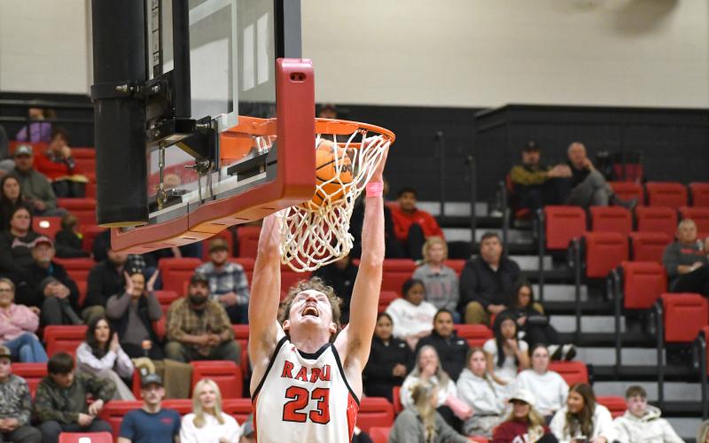 Wesley Branch/The Clayton Tribune. Rabun County senior Hayes Free flies in for a dunk in Rabun County’s 80-47 first-round playoff win over Chattooga on Feb. 24. Free and the Wildcats will face either No. 15 Heard County or No. 18 Jefferson County on Friday or Saturday in the Sweet 16.
