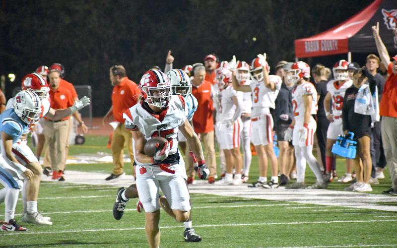 Wesley Branch/The Clayton Tribune. Rabun County senior Reid Giles breaks away from the defense for a touchdown run in Rabun County’s win over Providence Christian Academy on Sept. 26, 2025. Giles led the Wildcats in rushing and receiving as a senior and junior. Giles has committed to Erskine College to play football.