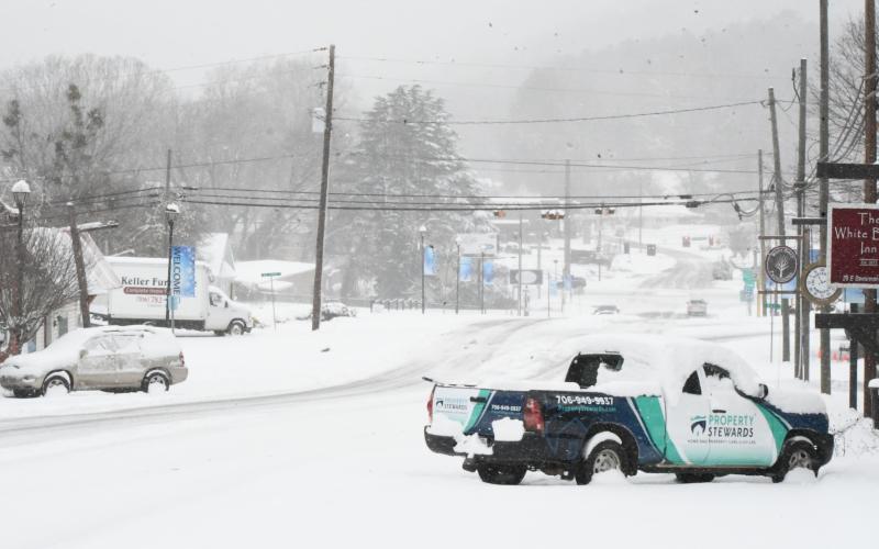 Wesley Branch/The Clayton Tribune.  Savannah Street in Clayton looks more like an opportunity to go skiing than to drive a vehicle.