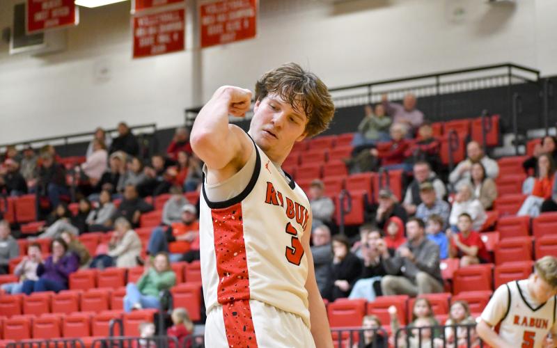 Wesley Branch/The Clayton Tribune. Rabun County senior Huey Blalock flexes after a basket in Rabun County’s 57-45 Feb. 4 win over Providence Christian Academy. Blalock earned Region Player of the Year for the second consecutive season.