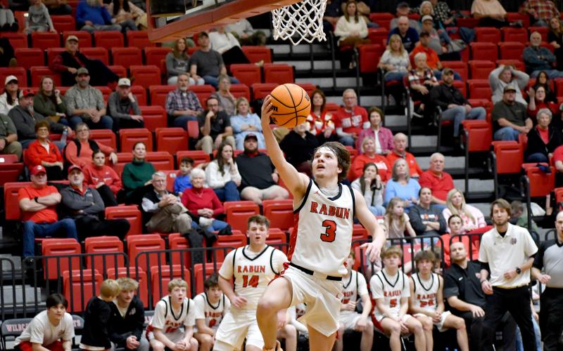 Wesley Branch/The Clayton Tribune. Rabun County senior Huey Blalock skies for a layup in Rabun County’s 70-66 win over Banks County on Feb. 10. Blalock and the Wildcats have set a new program record for regular season wins with 21 thus far.