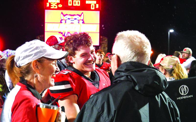 Enoch Autry/The Clayton Tribune. Senior Reid Giles and his Wildcat teammates were all smiles after Rabun County’s Nov. 21 playoff shutout of Berrien County to reach the Elite Eight. In the game, Giles had 175 yards rushing, an interception and a blocked field goal. The All-State player now will play collegiately at Erskine College in Due West, S.C.