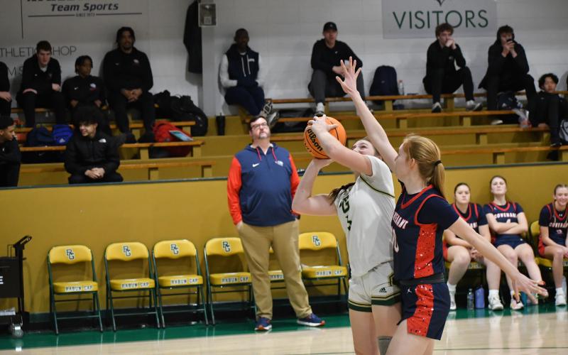 Wesley Branch/The Clayton Tribune. Rabun Gap sophomore Vivian McNabb lays the ball up during Rabun Gap’s 39-22 first-round playoff win over Covenant Day School on Feb. 17. McNabb and her older sister, senior Lydia McNabb, have been key contributors for Rabun Gap this season.