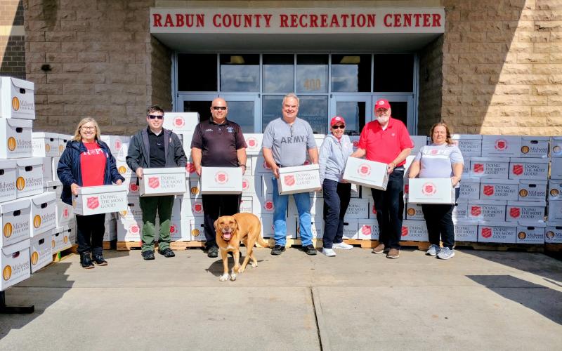 Pictured are Lanita Lloyd,The Salvation Army divisional Emergency Disaster Services (EDS) director for Georgia, left; Jonathan Jones, Georgia Emergency Management Agency (GEMA) Area 1 Field coordinator; Brian Panell, Rabun County EMA Director; Rabun County Commissioner Kent Woerner with his dog named “New Dog;” The Salvation Army volunteers Marsha Kaufmann and Jim Kaufmann; and Cindy Puryear, The Salvation Army divisional Emergency Disaster Services (EDS) assistant director for Georgia.