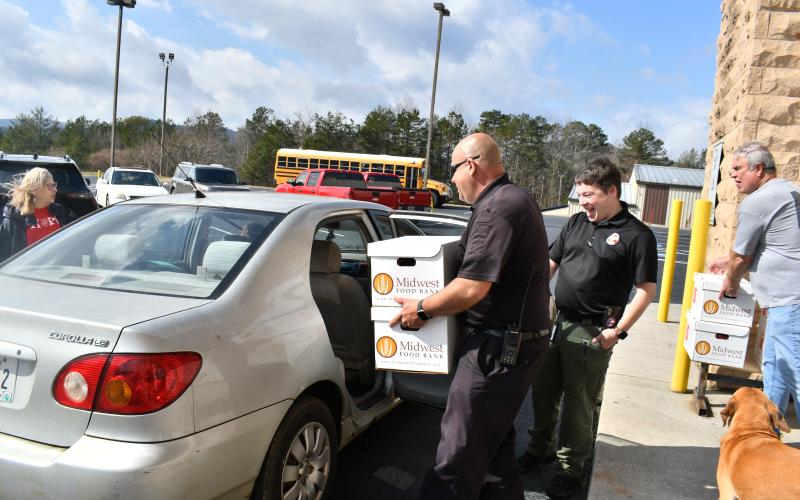 Megan Horn/The Clayton Tribune. Rabun County EMA and The Salvation Army partner to distribute food to those in need in the community following Winter Storms Fern and Gianna. Pictured are Lanita Lloyd,The Salvation Army divisional Emergency Disaster Services (EDS) director for Georgia; Rabun County EMA Director Brian Panell; Jonathan Jones, Georgia Emergency Management Agency (GEMA) Area 1 Field coordinator; and Rabun County Commissioner Kent Woerner.