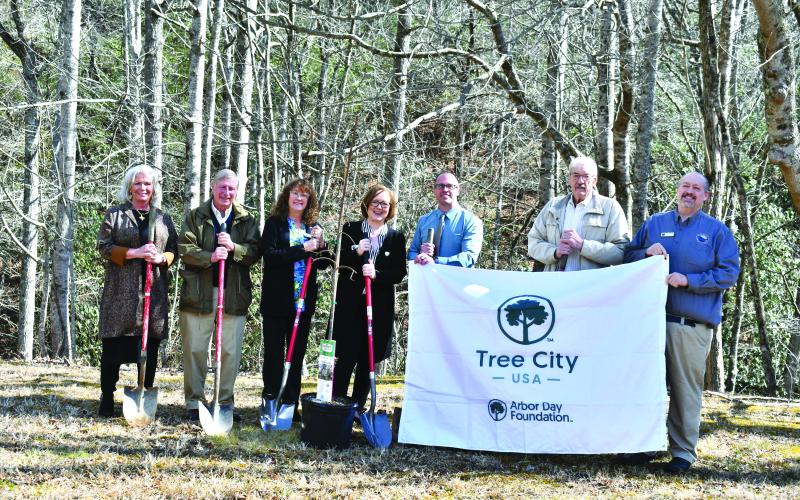 Megan Horn/The Clayton Tribune. City of Sky Valley officials support planting a Cherry Tree to celebrate Georgia Arbor Day as well as George Washington, whose birthday is Feb. 22, and America’s 250th birthday, which is coming up on July 4. Pictured are Sky Valley Council Members CareySue Beasley, left; Jim Curtis; Beth Pence; Mayor Benita Cotton-Orr; Council Members Jesse Price; Tony Allred; and City Manager Jason Streetman.