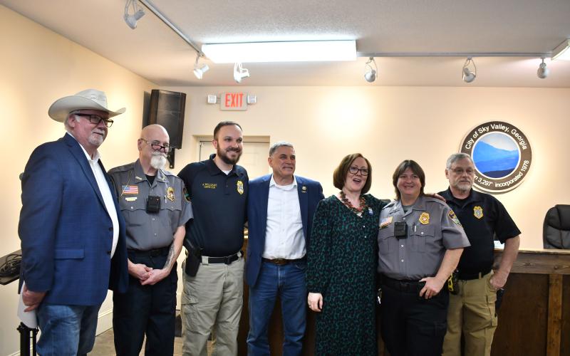 Megan Horn/The Clayton Tribune. U.S. Rep. Andrew Clyde of Georgia’s Ninth District, honors Sky Valley Police Officer Andrew Williams as “Special Georgian of the Ninth” during a special event Feb. 19. Pictured are Michael Palmer, representative of North Georgia Mountains Lodge #112 of the Georgia State Fraternal Order of Police (FOP), left; Sky Valley Police Chief Ron Baumes; Williams; Clyde; Sky Valley Mayor Benita Cotton-Orr; Officer Dottie Clark; and Lt. David Edwards.