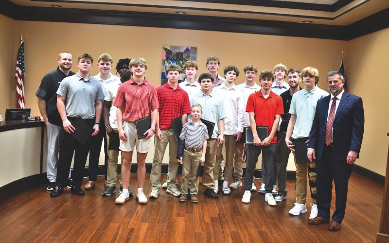 Megan Horn/The Clayton Tribune. The Rabun County High School Boys basketball team was recognized and congratulated for their Class A Division I state championship win during Monday’s Board of Education meeting. The team captured its first state title win with its 52-43 defeat of Southwest in a loud and packed Macon Coliseum on March 13.