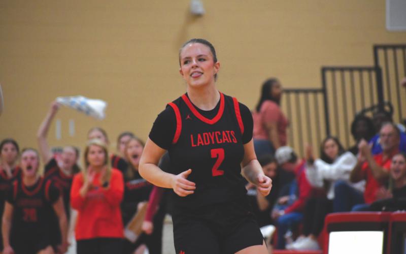 Wesley Branch/The Clayton Tribune. Rabun County junior Adelyn Thompson smirks as she walks back on defense after a made 3-pointer just before the first-half buzzer in Rabun County’s 46-44 loss to Thomasville in the Elite Eight on March 3. Thompson was a first-team All-Region selection this season.