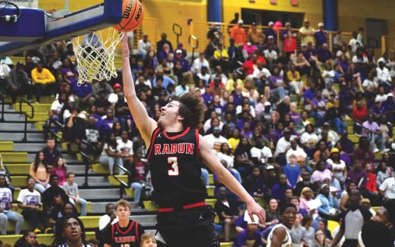Wesley Branch/The Clayton Tribune. Rabun County senior Huey Blalock lays the ball in during Rabun County’s 70-59 win over Fitzgerald in the Final Four on March 7. Blalock posted a triple-double in the victory at Fort Valley State University, helping send the Wildcats to the state title game March 13.