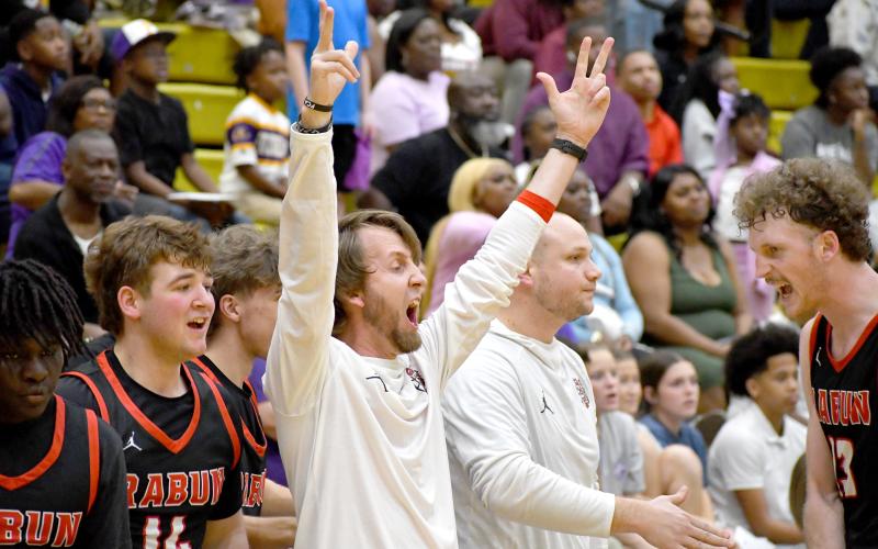 Wesley Branch/The Clayton Tribune. Rabun County head coach David Adcock celebrates as the clock winds down in Rabun County’s 70-59 Final Four victory over Fitzgerald at Fort Valley State University on March 7. The Wildcats are headed to the state championship for the first time in program history.