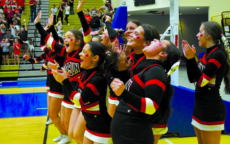 Enoch Autry/The Clayton Tribune. RCHS cheerleaders celebrates the RCHS boys’ semifinal win on March 7.