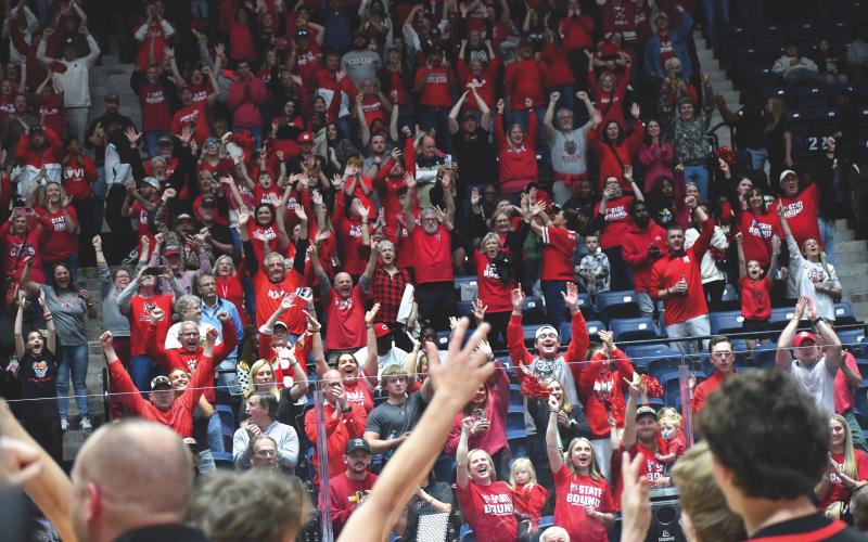 Wesley Branch/The Clayton Tribune. Rabun County fans cheer for the Wildcat basketball team after the boys received the state championship trophy for their 52-43 March 13 win over Southwest at the Macon Coliseum. RCHS’ first state title in boys hoops capped off a historic season which resulted in several accolades.