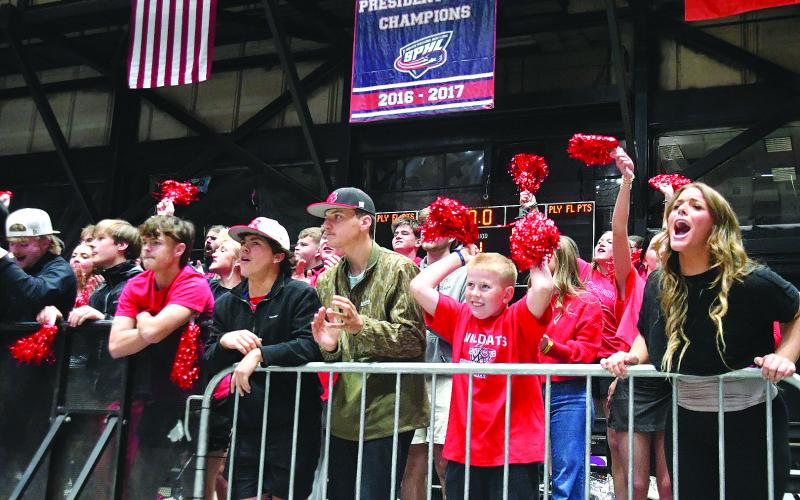 Photos by Enoch Autry/The Clayton Tribune.  While a strong contingent of Wildcat Nation were in the stands at the coliseum, some also got the chance to cheer in the student section behind the RCHS cheerleaders.