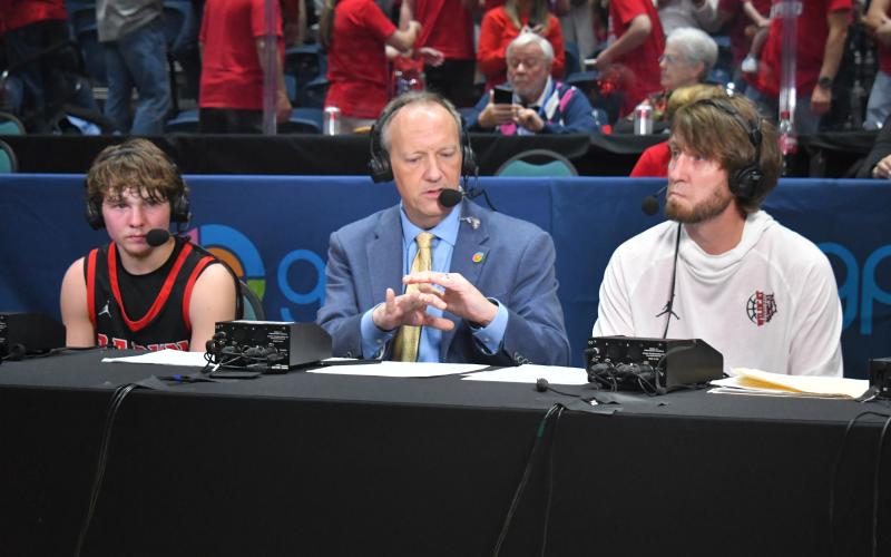 Wesley Branch/The Clayton Tribune. GPB’s Jon Nelson interviewed state title game MVP Huey Blalock and head coach David Adcock, whose father coached basketball for 31 years and won a state title at Glenwood School in Phenix City, Ala. Mike Adcock passed away in 2009. Blalock finished the game with 29 points, six rebounds and five assists.
