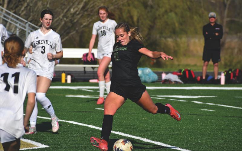 Wesley Branch/The Clayton Tribune. Rabun Gap junior Maile Sirois pushes the ball down the field in Rabun Gap’s 3-0 loss to Asheville High School at home on March 23. Sirois is one of three captains for the Eagles, who are 4-4 on the season.