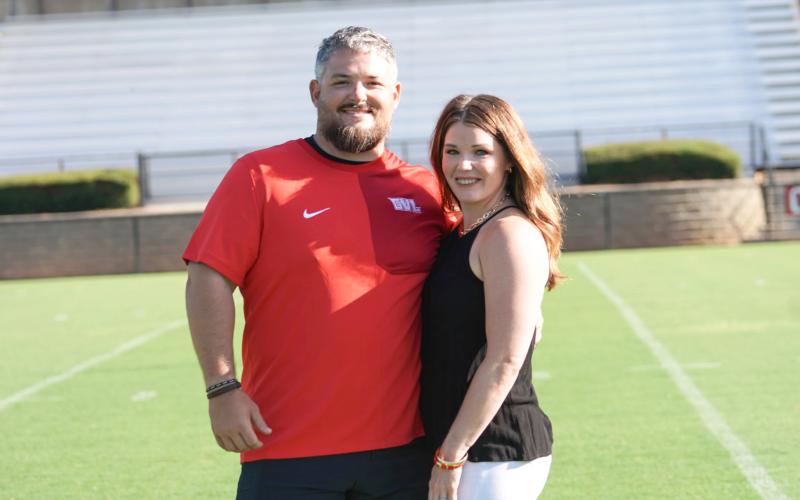 Submitted Photo. Jake Boldin stands with his wife Abby. Boldin has been hired as Rabun County’s new tight ends coach, special teams coordinator and director of football operations for the 2026-2027 school year.