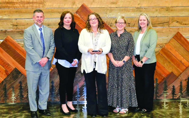 Submitted. Angel McCrackin was honored as the 2026 recipient of the Philip Wright Award for her dedication to improving educational outcomes for students with disabilities. Pictured are Superintendent Steven Cole, left; Renea Jarrard, student services; McCrackin; Meadow Krockum, director of student services; and Kelly McKay, assistant superintendent.