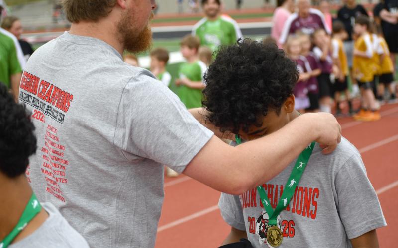Wesley Branch/The Clayton Tribune. The Rabun County Middle School boys soccer team received medals for its 14-0 and region champion success this season at the Rabun County High School soccer games on March 31 versus Banks County.