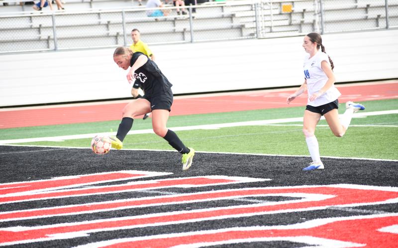 Wesley Branch/The Clayton Tribune. Rabun County Freshman Millie Southards fires a shot toward the goal in Rabun County’s 7-0 win over Banks County on March 31. Southards finished the game with one goal and two assists.