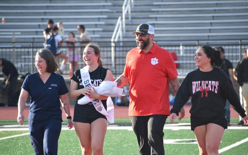 Wesley Branch/The Clayton Tribune. Rabun County senior Abbey Courtney is escorted by her family on senior night for the RCHS girls soccer team. Courtney has been a member of the varsity Lady Cats for three years.