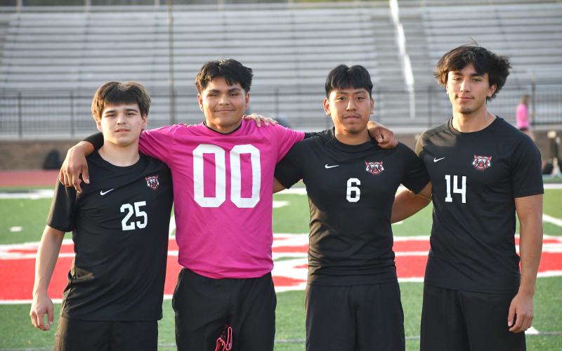 Wesley Branch/The Clayton Tribune. The Rabun County seniors pose for a photo after the senior night festivities ahead of Rabun County’s 1-0 win over White County on April 3. The seniors (from left) are Evan Woodall, Chris Olvera, Christian Avila and Joseph Merino-Silva. RCHS plays on the road on April 15 in Athens for the region title
