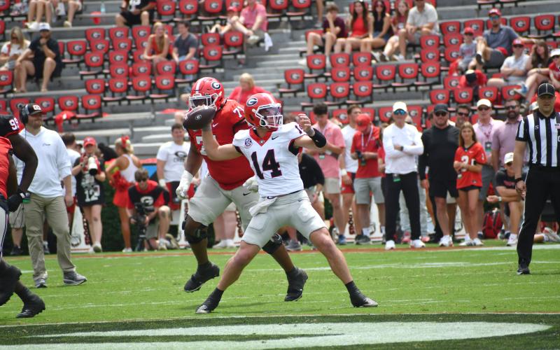 Wesley Branch/The Clayton Tribune. Georgia quarterback Gunner Stockton launches a pass downfield in Georgia’s G-Day scrimmage. Stockton, the former Rabun County record-setting QB, is preparing for his final season of college football.