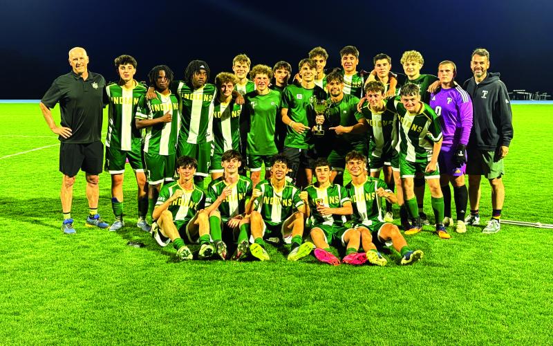 TFS Athletics. A happy Tallulah Falls School boys soccer team shows off the latest region title trophy after the April 24 win.