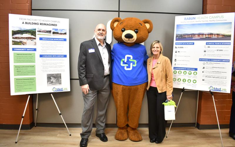 Megan Horn/The Clayton Tribune. City of Clayton Mayor Roy Quilliams, left, and Clayton City Manager Trudy Crunkleton attend the March 26 ribbon cutting and grand opening event for MedLink Georgia at the new Rabun Health Campus.