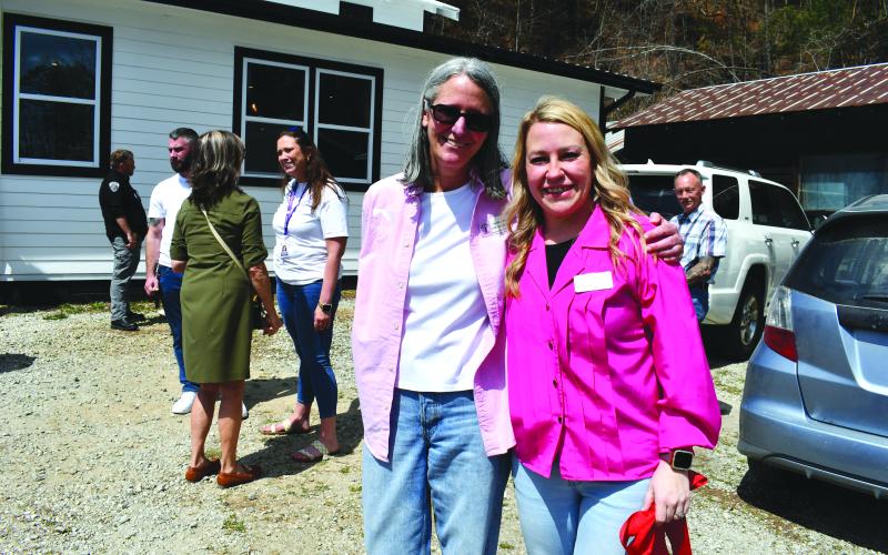 Megan Horn/The Clayton Tribune. Caroline Wallis, executive director of Fight Abuse In The Home (F.A.I.T.H., Inc.), and Ashley York, Women of Worth (WOW) Recovery director, celebrate the official grand opening of the new WOW Recovery dorm located at 5989 Highway 441, Lakemont. The nonprofits have partnered in a collaborative program through grant funding called “Breaking Cycles of Abuse Together.”