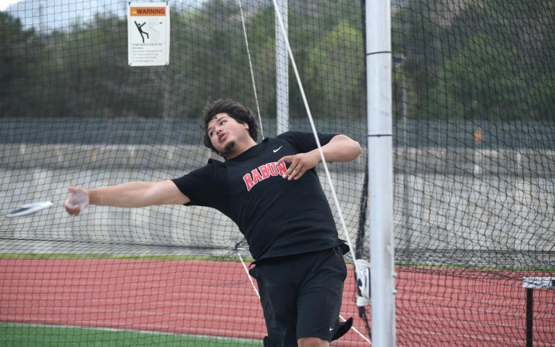 Photo by Wesley Branch/The Clayton Tribune. Rabun senior JP Lopez competes in the discus at the Bo James invitational at Rabun County High School on April 2. Lopez qualified for the state championship meet for the discus and shot put following his performance at the sectional meet at Bremen High School on May 4.