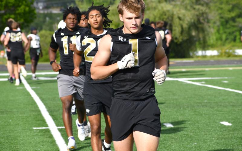 Wesley Branch/The Clayton Tribune. Rabun Gap Class of 2028 linebacker Jay Schell warms up for Rabun Gap’s May 7 college coaches social. Schell has 36 Division I offers, with LSU most recently offering him a scholarship.