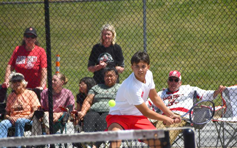 Wesley Branch/The Clayton Tribune. Rabun County junior Braylon Kelly eyes the ball during his doubles match with Andrew Conner versus Model on May 8 at RCHS. Kelly and Conner were victorious, 6-3, 6-1.