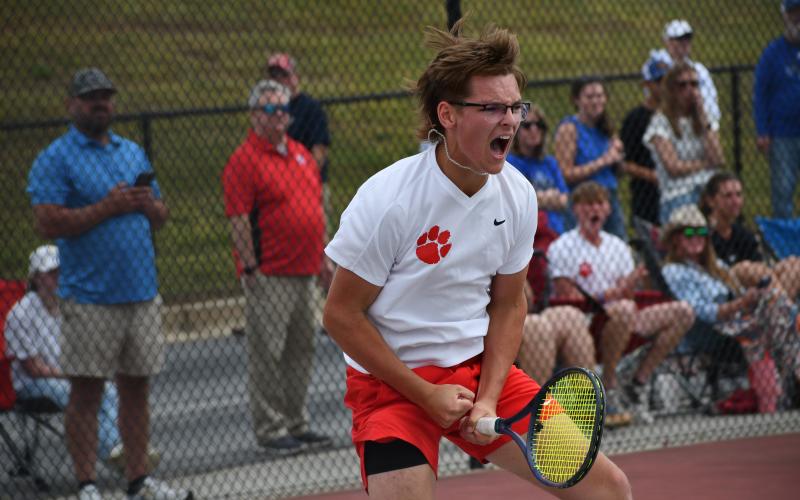 Wesley Branch/The Clayton Tribune. Rabun County junior Lleyton Phillips celebrates after his win on No. 1 singles versus Model on May 8 at Rabun County High School. Phllips and the Wildcats will play for the state championship on Wednesday in Rome