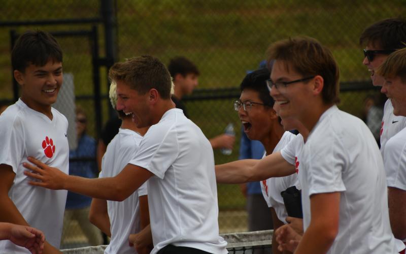 Wesley Branch/The Clayton Tribune. The Rabun County boys tennis team celebrates after its Final Four victory over Model on May 8 at Rabun County High School. The Wildcats will play in the state title versus Brantley County on May 13 in Rome at 12:30 p.m.