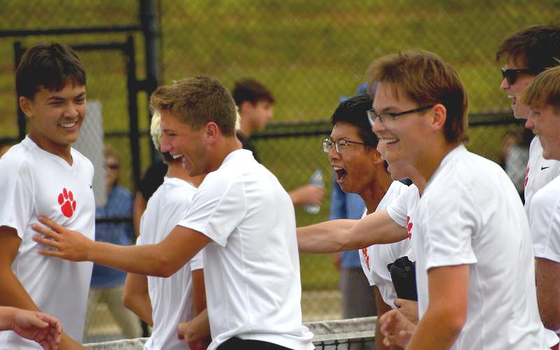 Wesley Branch/The Clayton Tribune. The Rabun County boys tennis team celebrates after its Final Four victory over Model on May 8 at Rabun County High School. The Wildcats were scheduled to play for the state title versus Brantley County on May 13 in Rome at 12:30 p.m.