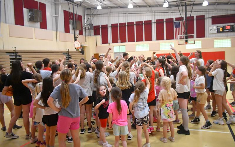Wesley Branch/The Clayton Tribune. The Rabun County Lady Cat players, coaches and campers wrap up day one of Lady Cats basketball camp on May 11 at the Rabun County Recreation Department. Over 100 campers were in attendance during the week.