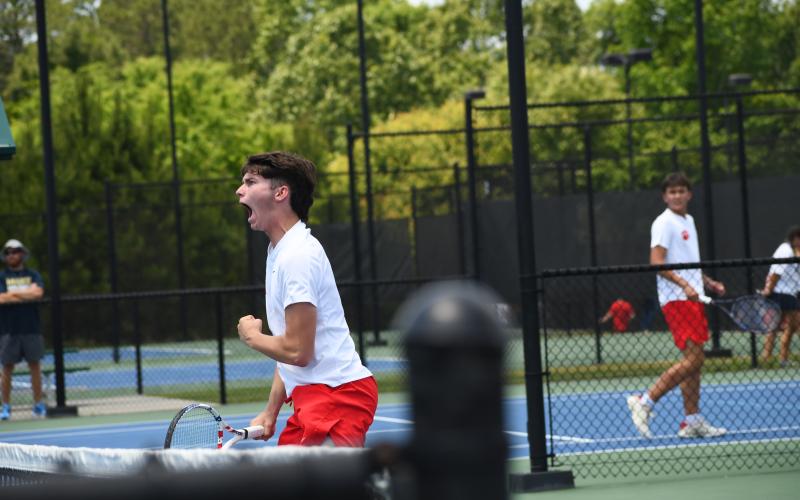 Wesley Branch/The Clayton Tribune. Rabun County senior Brady Darnell celebrates after a point during he and RCHS junior Landan Bedingfield’s match on No. 1 doubles versus Brantley County in the state championship on May 13 at the Rome Tennis Center. Darnell is one of two seniors on the boys tennis team.