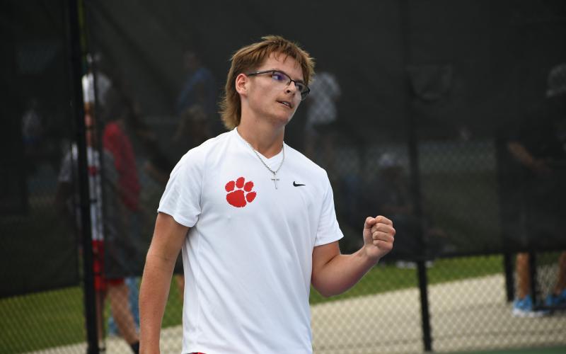Wesley Branch/The Clayton Tribune. Rabun County junior Lleyton Phillips celebrates after a point during his match on No. 1 singles versus Brantley County in the state championship on May 13 at the Rome Tennis Center. Phillips secured the lone point in the match for the Wildcats with a  6-3, 6-4 win.