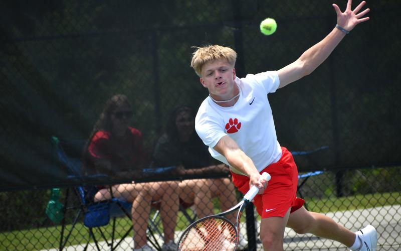 Wesley Branch/The Clayton Tribune. Rabun County junior Landan Bedingfield stretches out for the ball during he and Brady Darnell’s doubles match in the state championship versus Brantley County on May 13 at the Rome Tennis Center.
