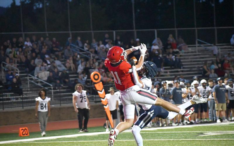 Wesley Branch/The Clayton Tribune. Rabun County junior wide receiver Reed Burrell hauls in a 32-yard touchdown pass over the top of a White County defender in the Wildcats’ 10-9 spring scrimmage win versus the Warriors on May 15. Burrell is one of the rising seniors in the RCHS football program.