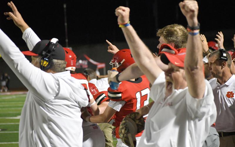 Wesley Branch/The Clayton Tribune. The Rabun County sideline celebrates as rising senior Bryan Avila’s 38-yard game-winning kick sails through the uprights to make it 10-9 in the Wildcats’ May 15 spring game versus White County.