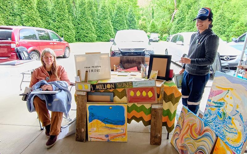Megan Horn/The Clayton Tribune. Folk artists Casey Perry and Kristie Perry participate in Dinglerfest May 2 and 3. They displayed their acrylic paintings, ink drawings and lamps.